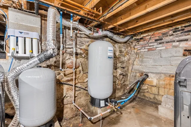 a view of a patio with a table and chairs