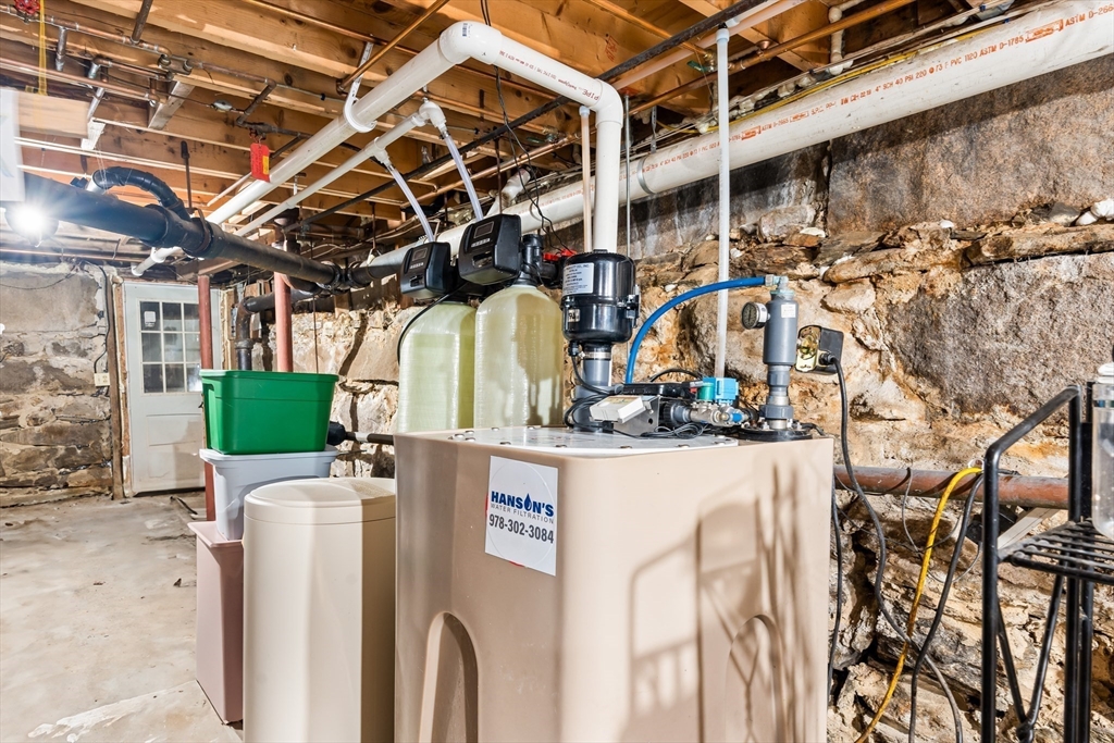 756 Northfield Road Lunenburg, MA 01462 - Photo 34 of 38 a view of a patio with a table and chairs