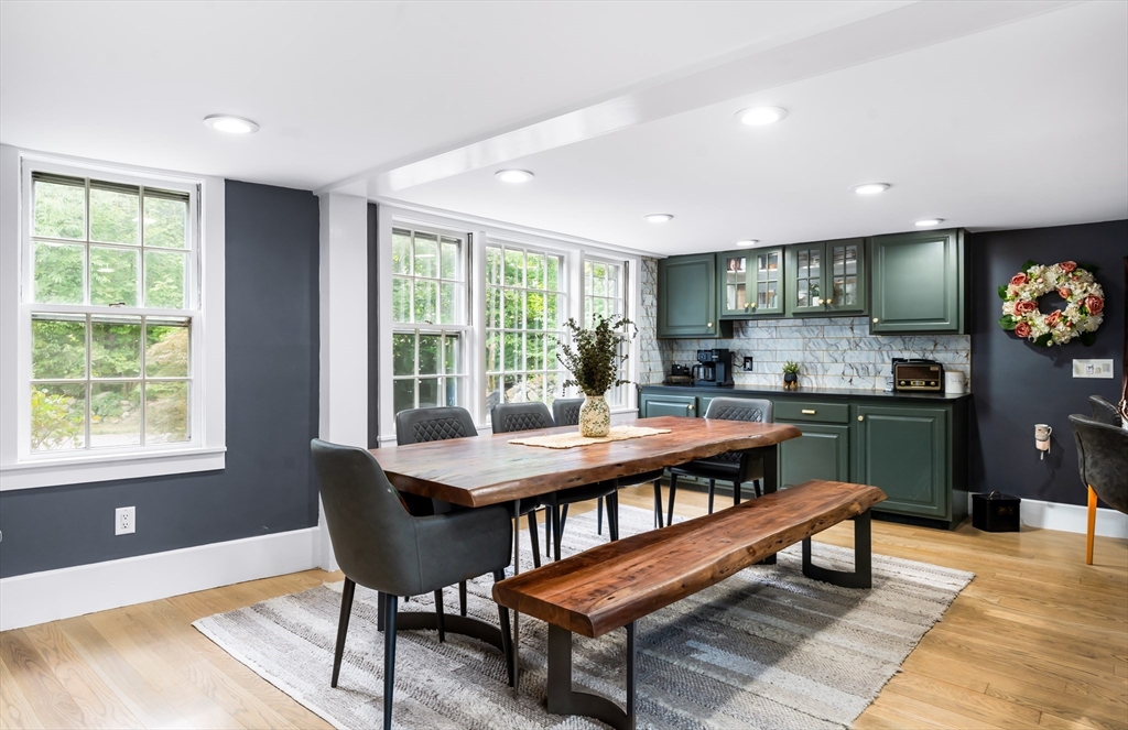 756 Northfield Road Lunenburg, MA 01462 - Photo 5 of 38 a dining room with furniture and wooden floor