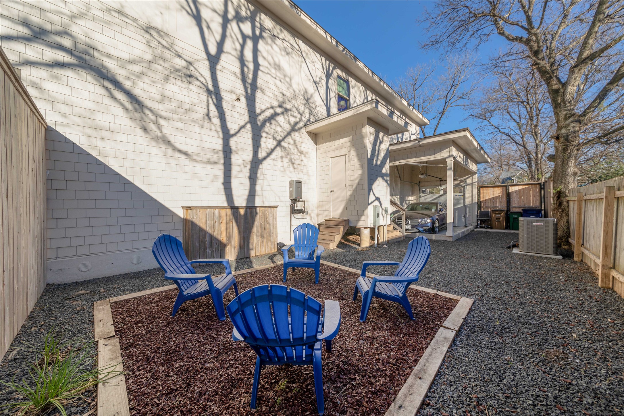 4704 Duval Street Austin, TX 78751 - Photo 13 of 29 a view of a chairs and table in backyard
