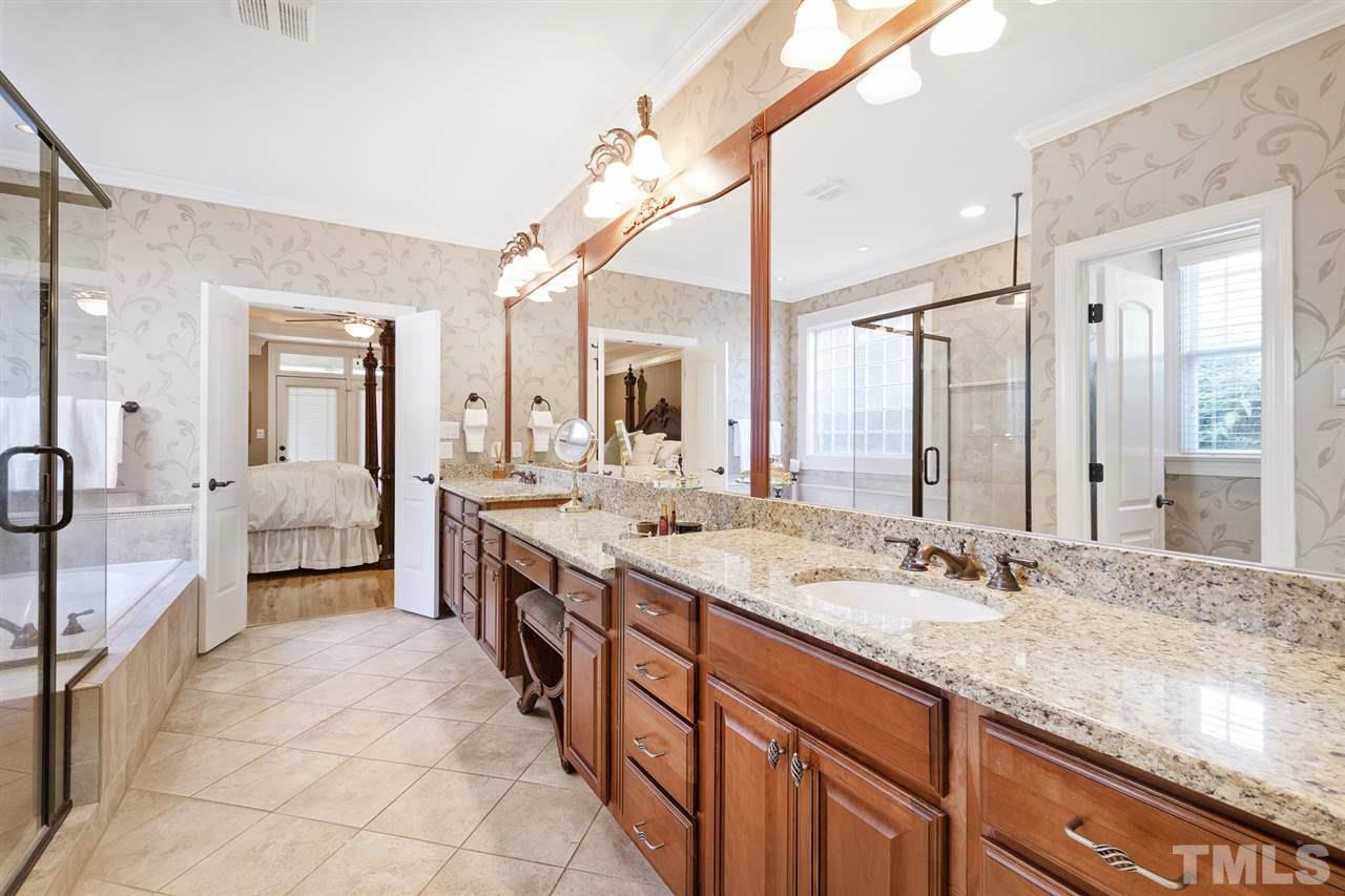 1806 Ridge Road Raleigh, NC 27607 - Photo 13 of 30 Master Bath features water closet, soaking tub/shower, and a long double vanity with granite counters
