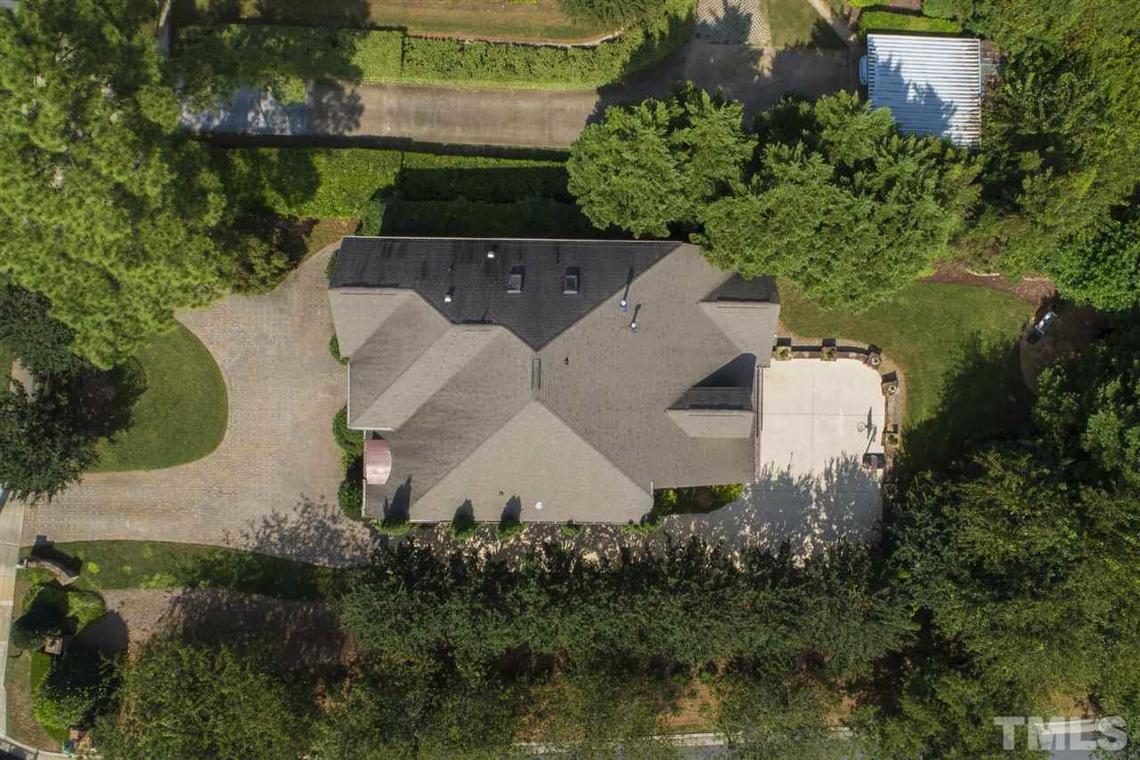 1806 Ridge Road Raleigh, NC 27607 - Photo 3 of 30 The large backyard is beautiful and feels quite private with the lush greenery. Best captured with your own eyes when you walk the property.