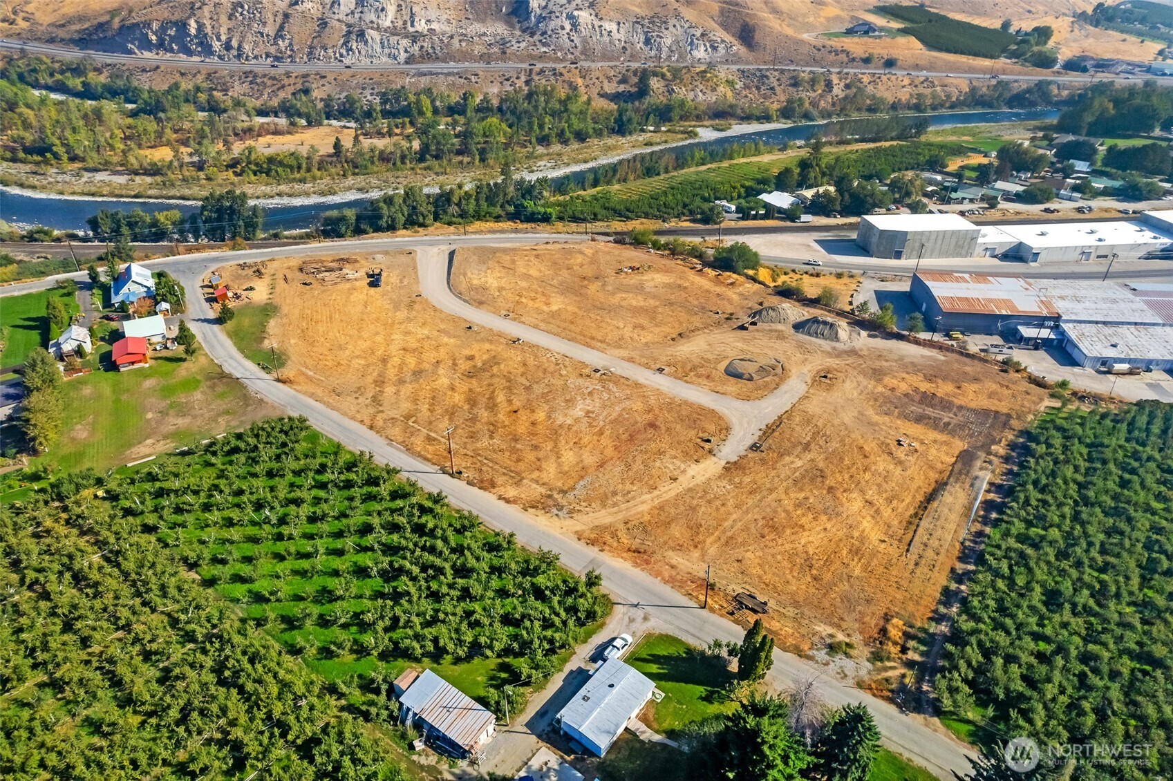 22 Farmer Lane Monitor, WA 98836 - Photo 2 of 13 an aerial view of a house with a swimming pool