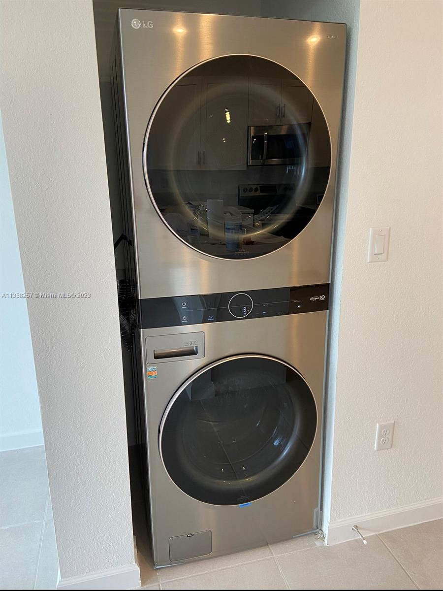 18107 Southwest 147th Court Miami, FL 33196 - Photo 14 of 25 a close up view of a washer and dryer