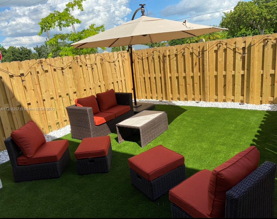 18107 Southwest 147th Court Miami, FL 33196 - Photo 5 of 25 a view of yard with outdoor seating