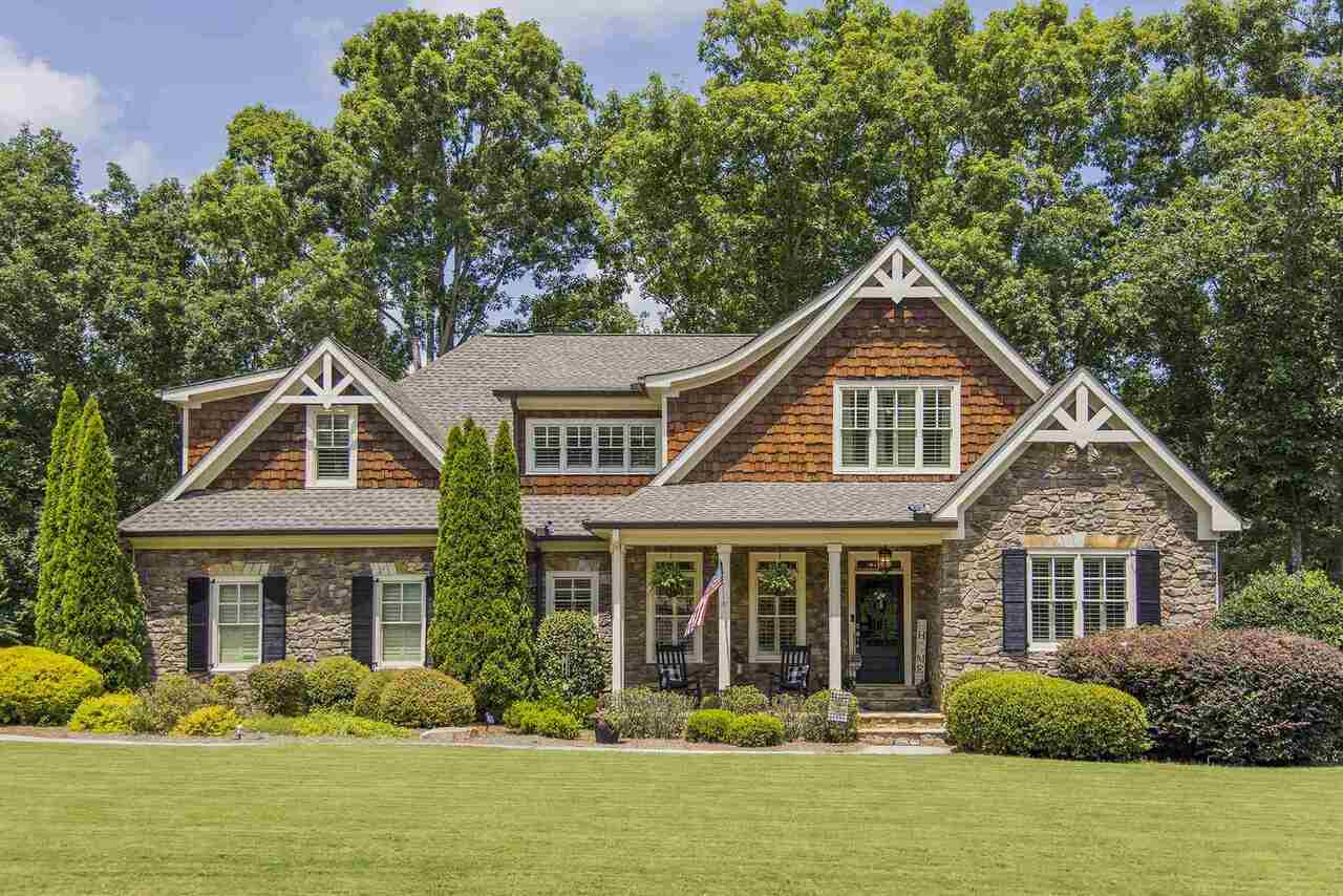13 Caversham Lane, Unit 57 Rome, GA 30161 - Photo 1 of 1 a front view of a house with garden