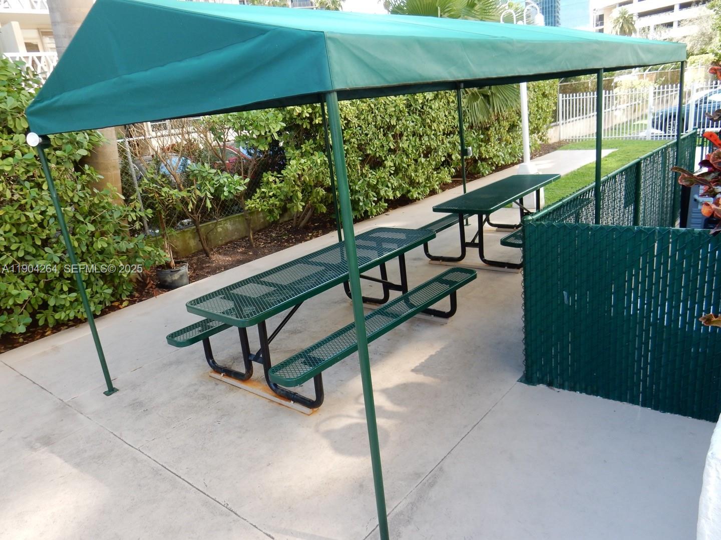 1420 Brickell Bay Drive, Unit 1406D Miami, FL 33131 - Photo 21 of 23 a view of outdoor space with seating