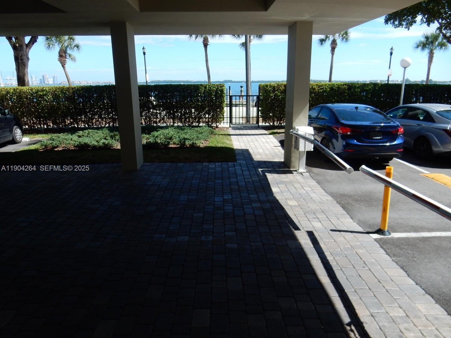 1420 Brickell Bay Drive, Unit 1406D Miami, FL 33131 - Photo 23 of 23 a view of deck with patio