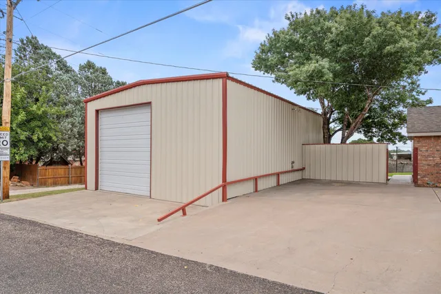 a view of backyard and tree