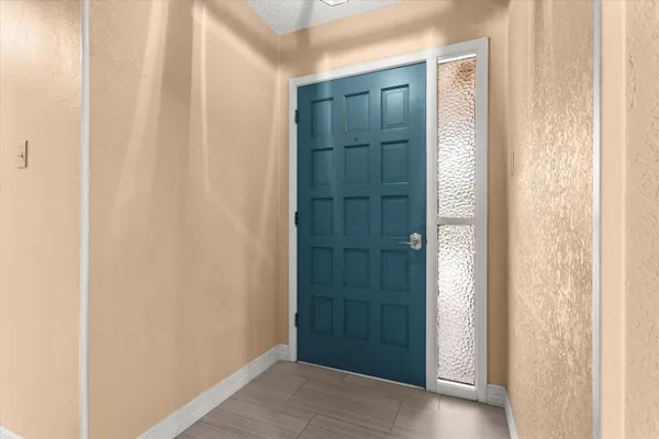 a view of front door with hallway