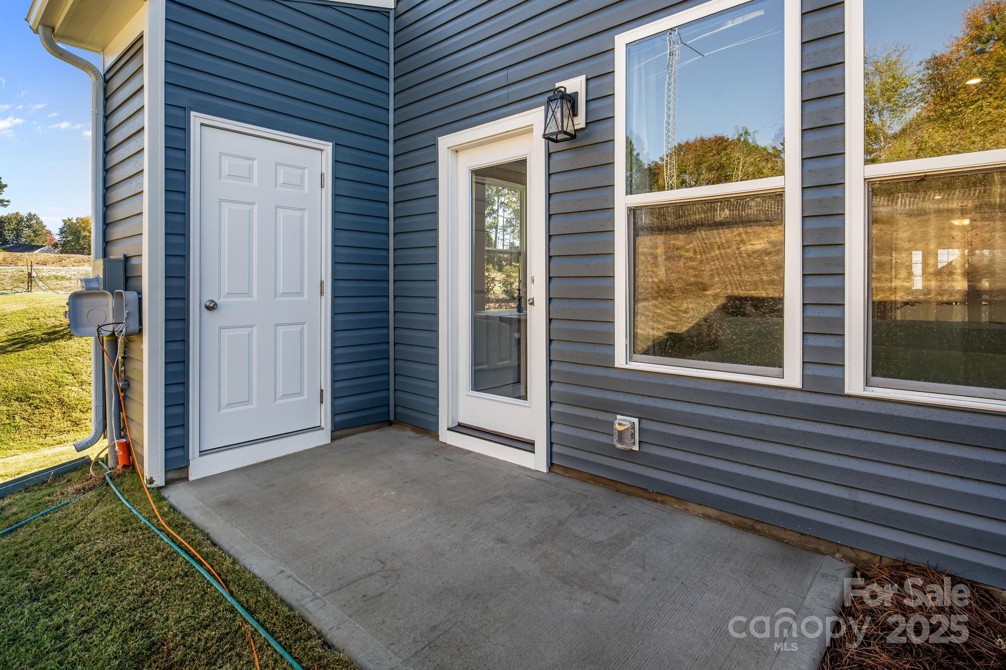 7716 Ethora Way, Unit 2 Charlotte, NC 28216 - Photo 25 of 30 a view of front door of house