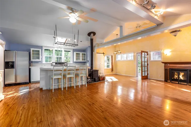 a view of a room with kitchen and dining room