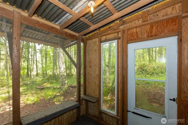 a view of a glass door and a window