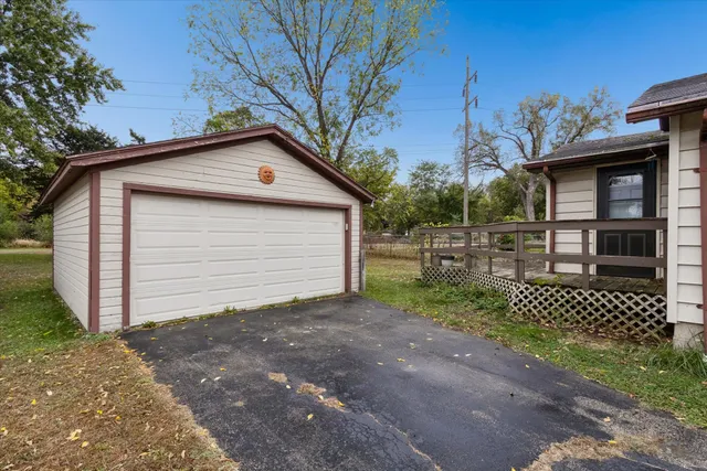 a small white house with a outdoor space