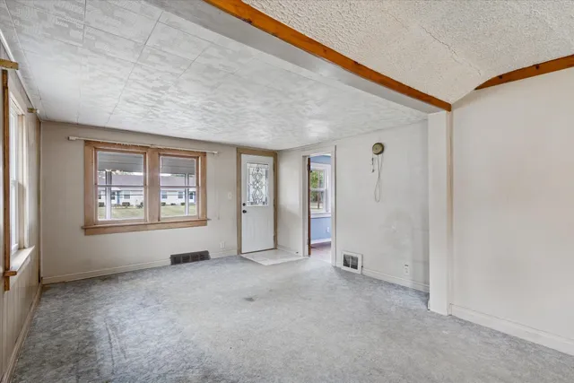 an empty room with windows