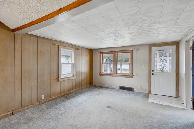 an empty room with windows