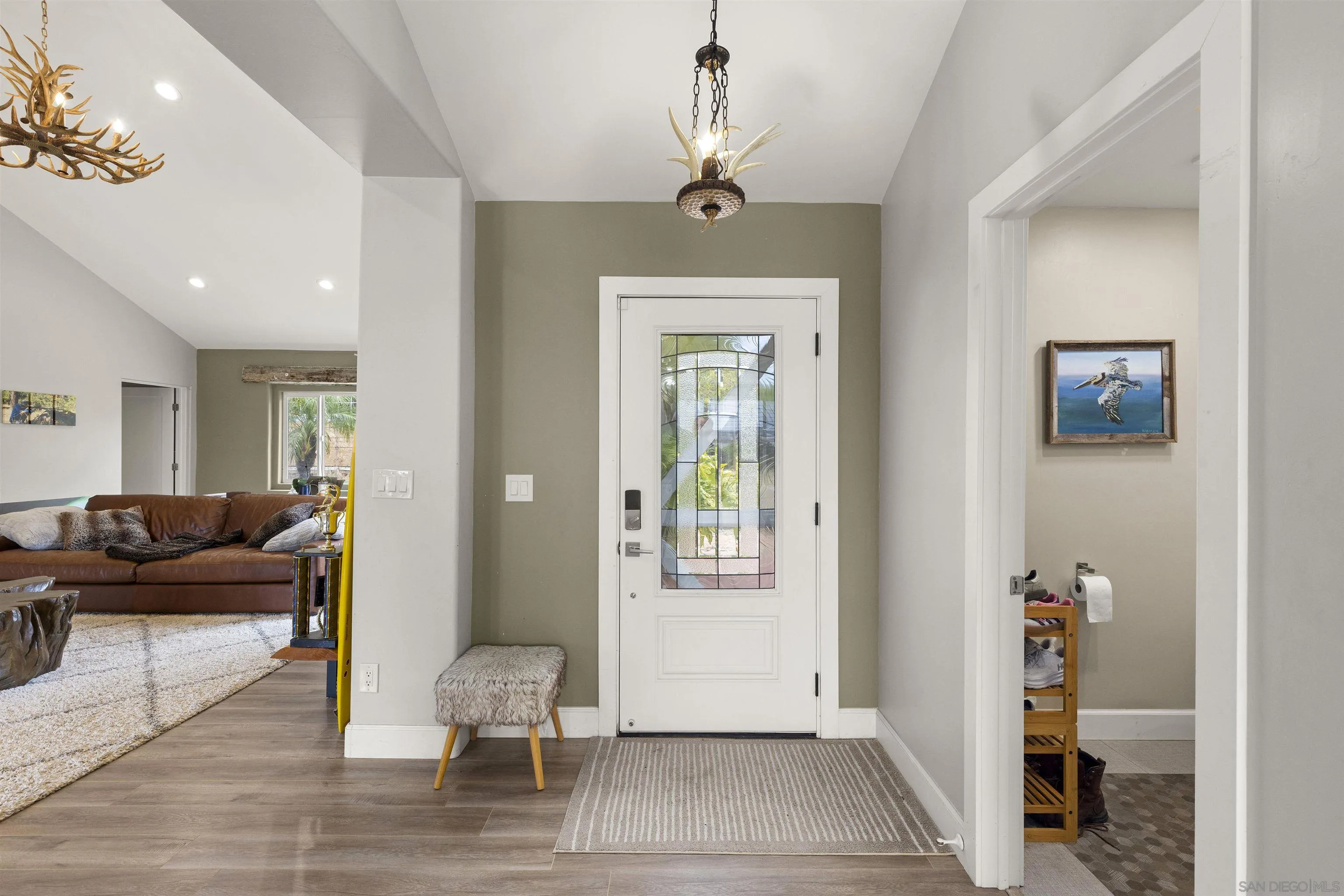 752 Bracero Road Encinitas, CA 92024 - Photo 11 of 46 a living room with furniture and a window