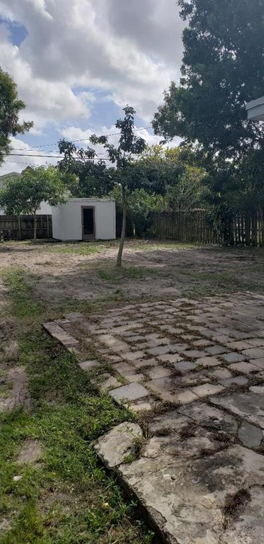 4230 Southwest 57th Avenue Davie, FL 33314 - Photo 5 of 10 a backyard of a house with lots of green space