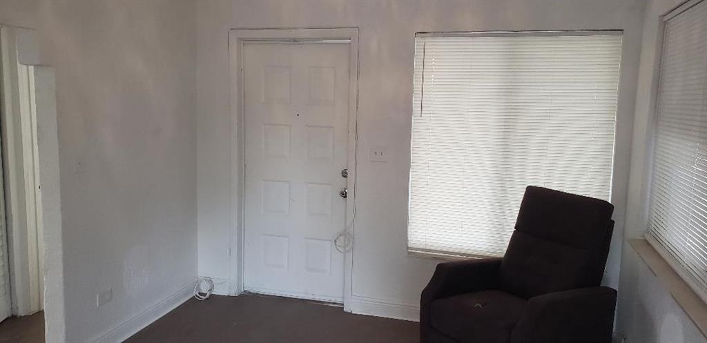 4230 Southwest 57th Avenue Davie, FL 33314 - Photo 6 of 10 a view of room with a chair and a window