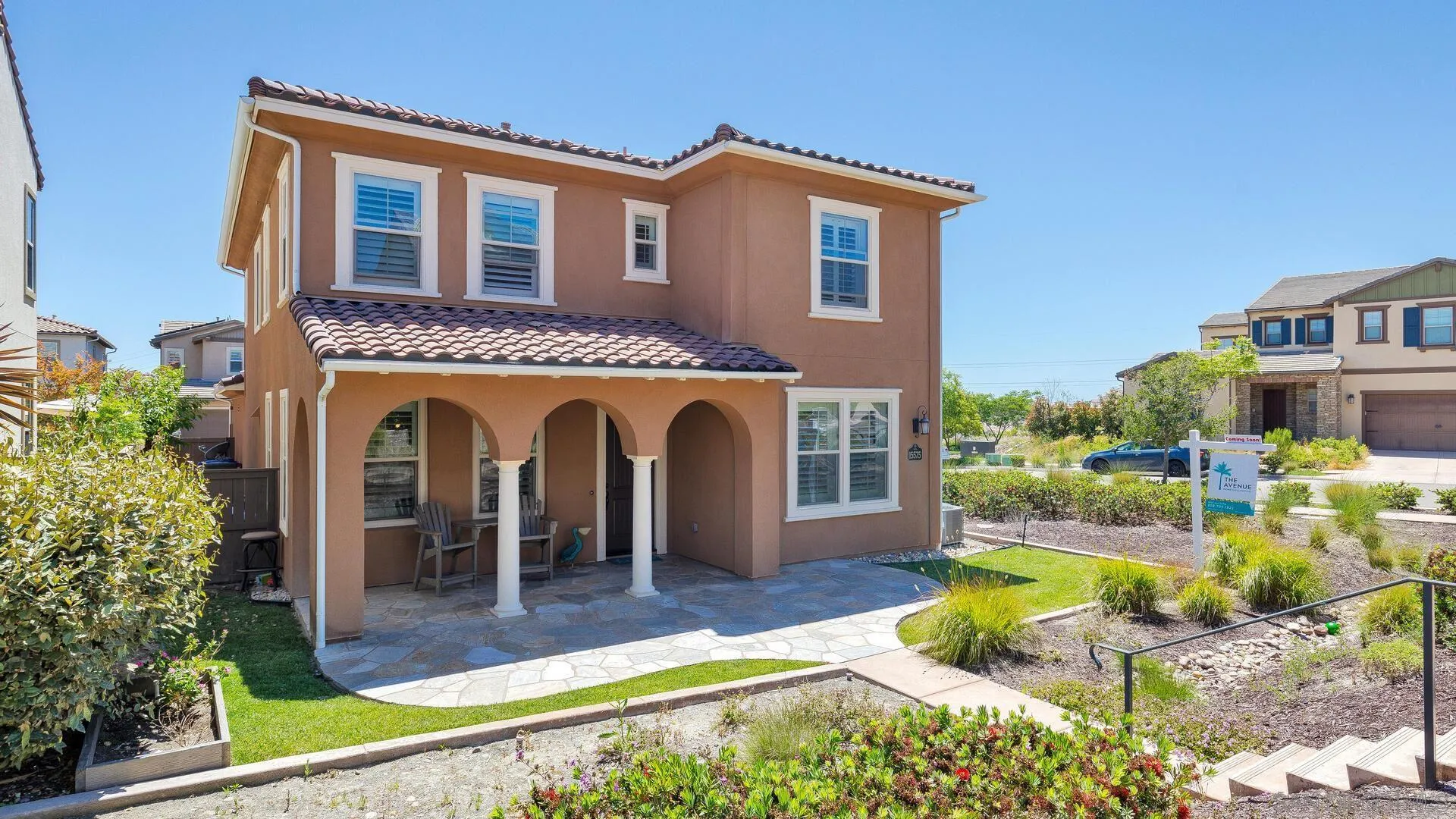 15575 Tanner Ridge Road San Diego, CA 92127 - Photo 1 of 41 a front view of a house with garden