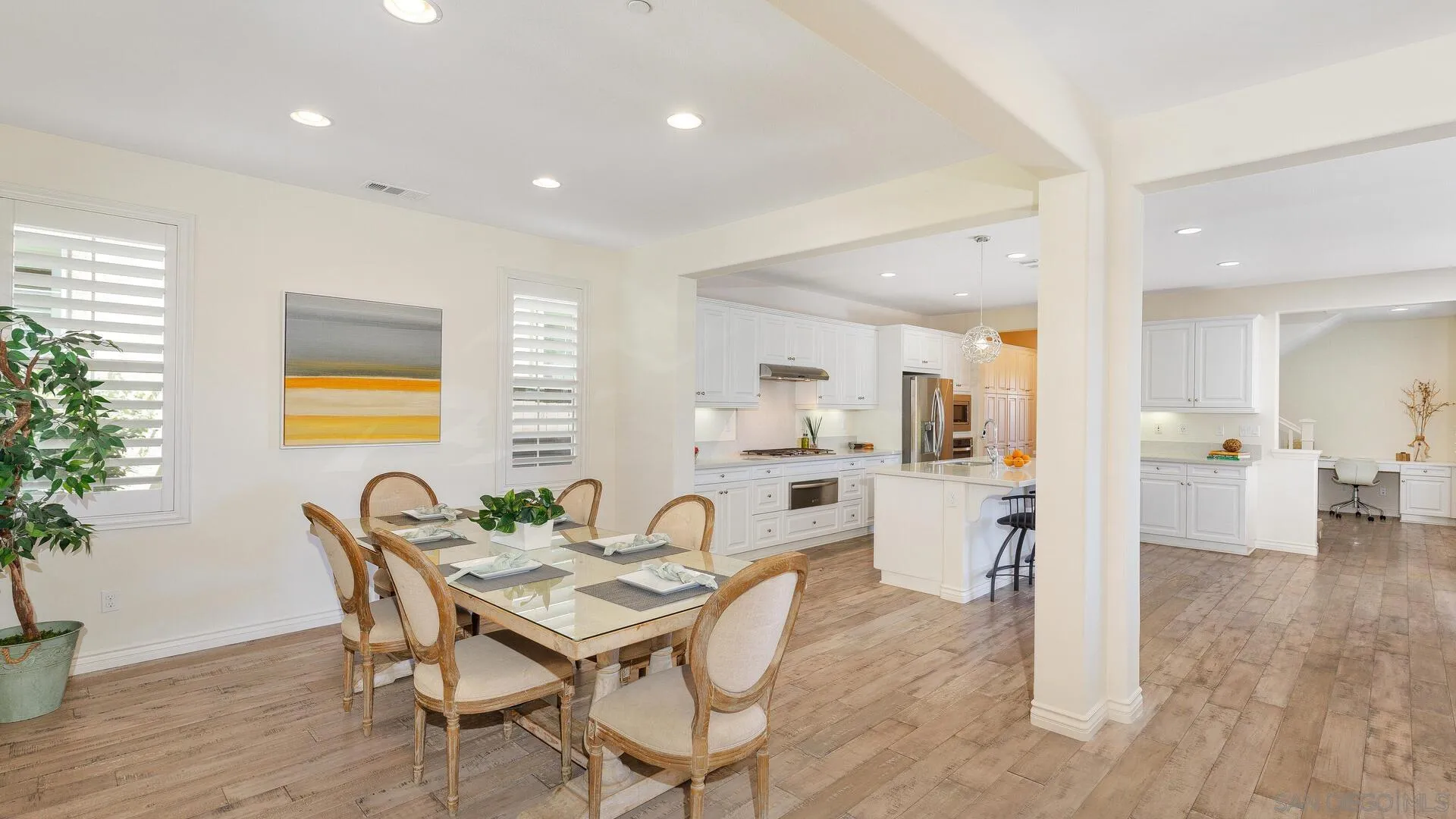 15575 Tanner Ridge Road San Diego, CA 92127 - Photo 11 of 41 a view of a dining room with furniture and wooden floor
