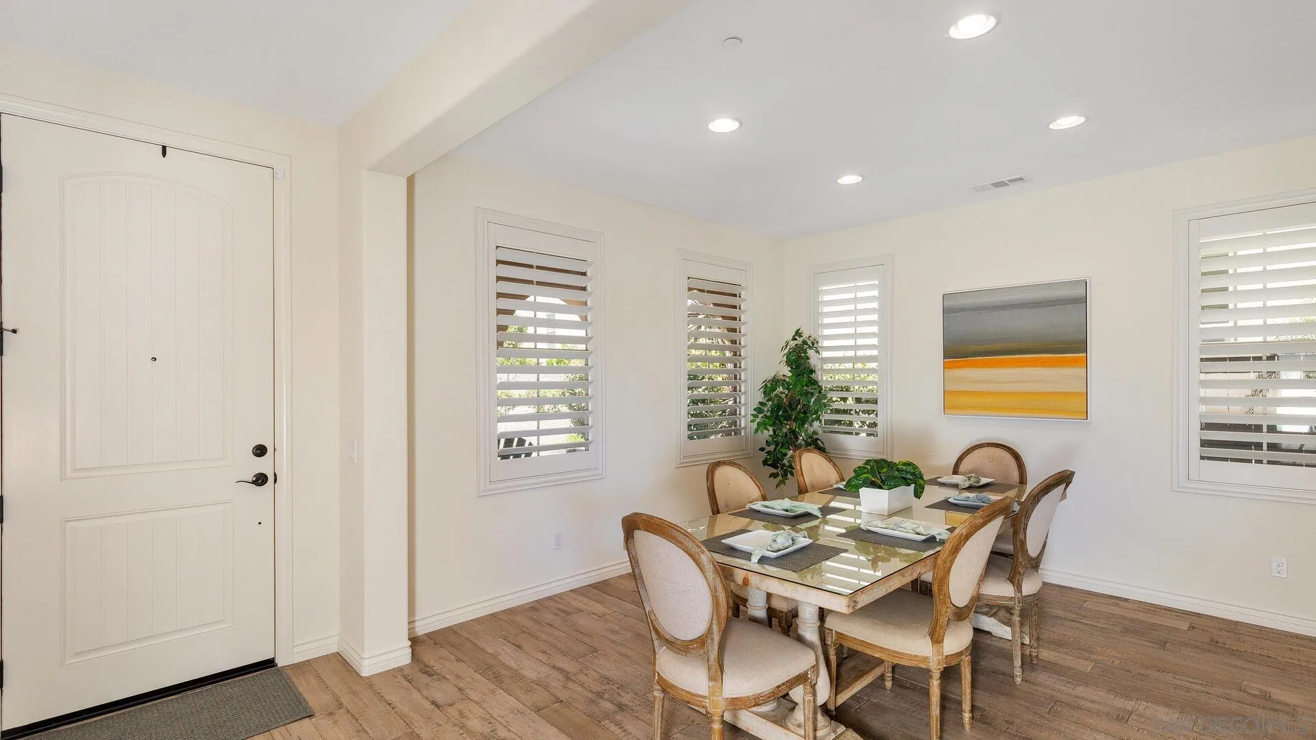 15575 Tanner Ridge Road San Diego, CA 92127 - Photo 12 of 41 a view of a dining room with furniture window and wooden floor