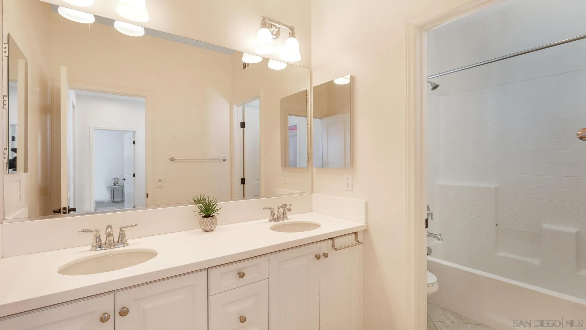15575 Tanner Ridge Road San Diego, CA 92127 - Photo 17 of 41 a bathroom with a double vanity sink mirror and double