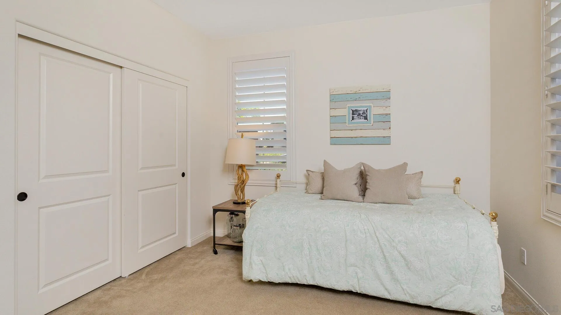15575 Tanner Ridge Road San Diego, CA 92127 - Photo 19 of 41 a bedroom with a bed and a window