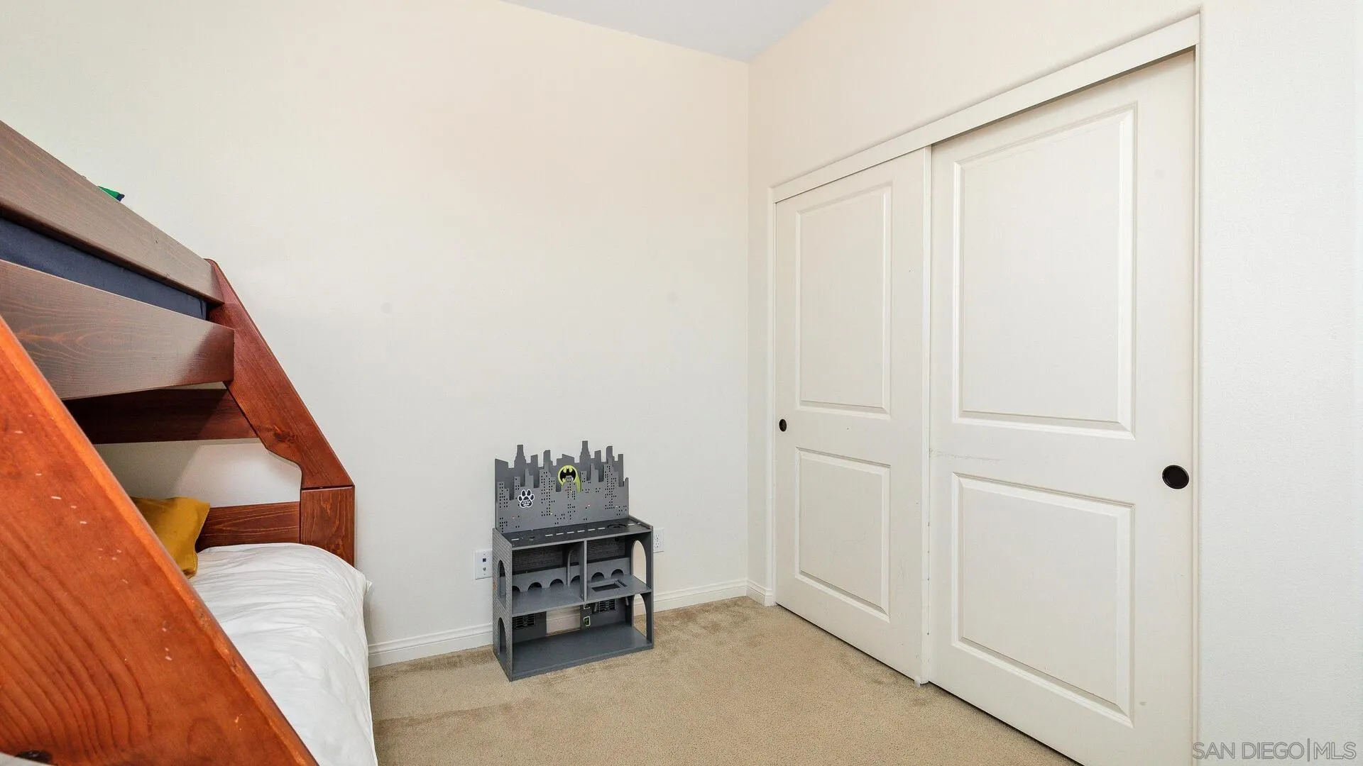 15575 Tanner Ridge Road San Diego, CA 92127 - Photo 27 of 41 a view of walk in closet with clothes and shoes