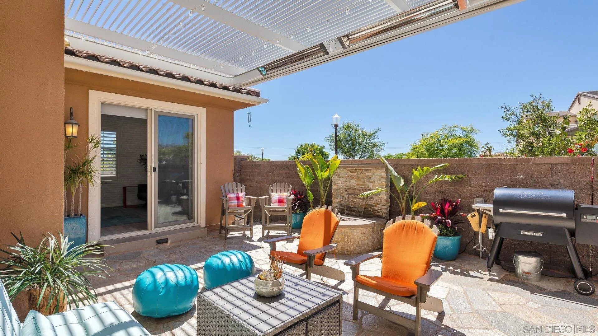 15575 Tanner Ridge Road San Diego, CA 92127 - Photo 32 of 41 a front view of a house with outdoor seating