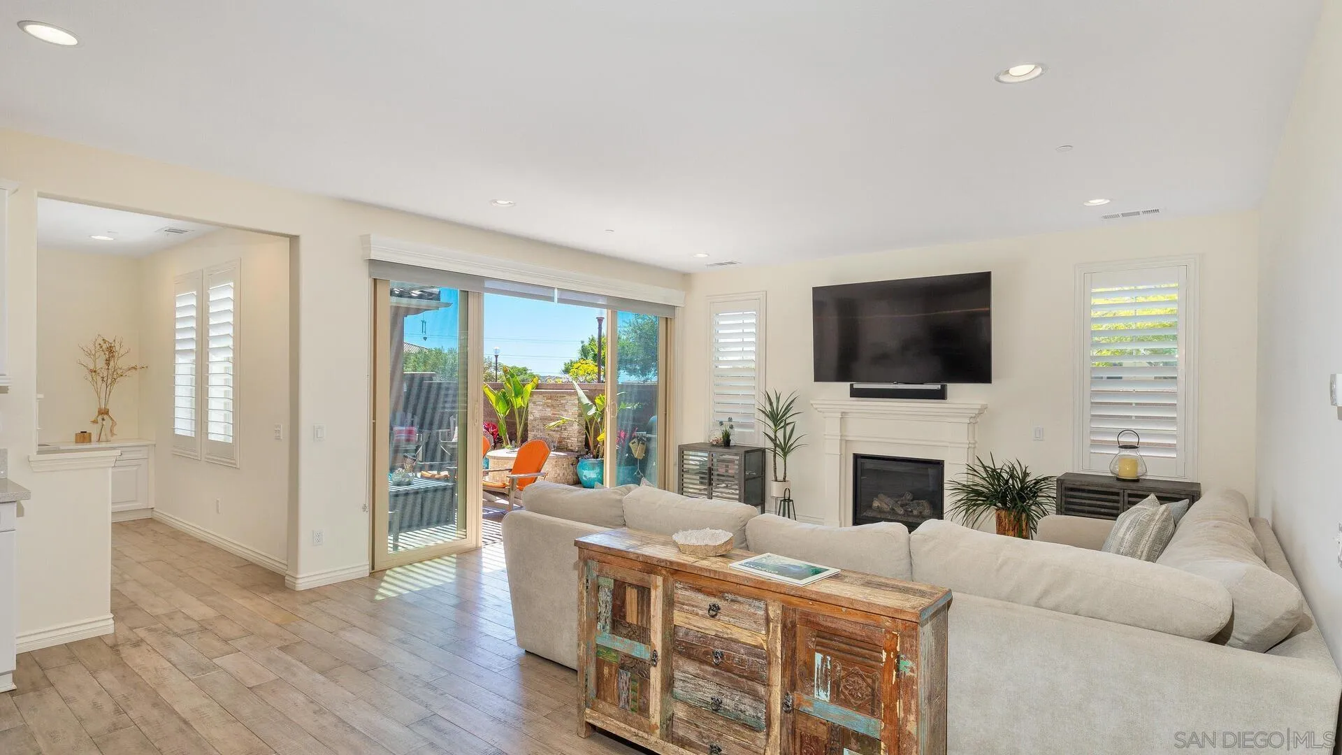 15575 Tanner Ridge Road San Diego, CA 92127 - Photo 5 of 41 a living room with furniture and a flat screen tv