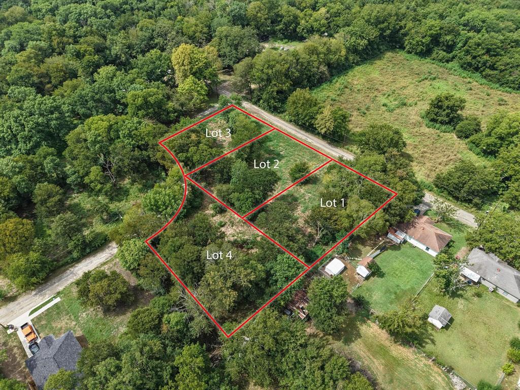 3 Smith Street Bonham, TX 75418 - Photo 7 of 12 a view of a backyard