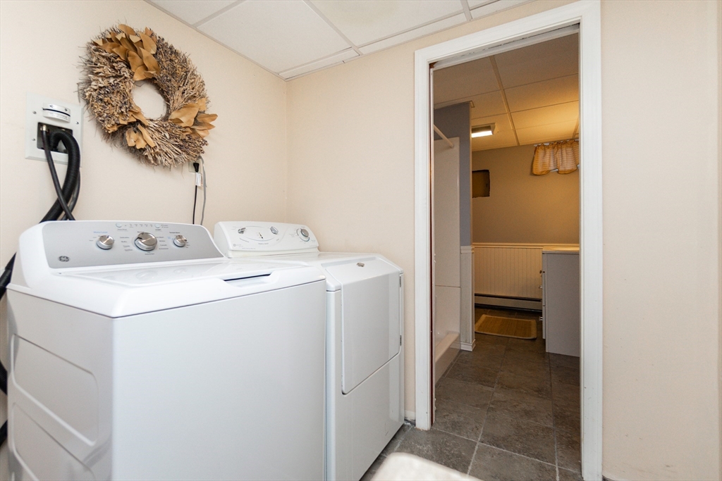 63 Bow Street Saugus, MA 01906 - Photo 27 of 42 a utility room with dryer and washer