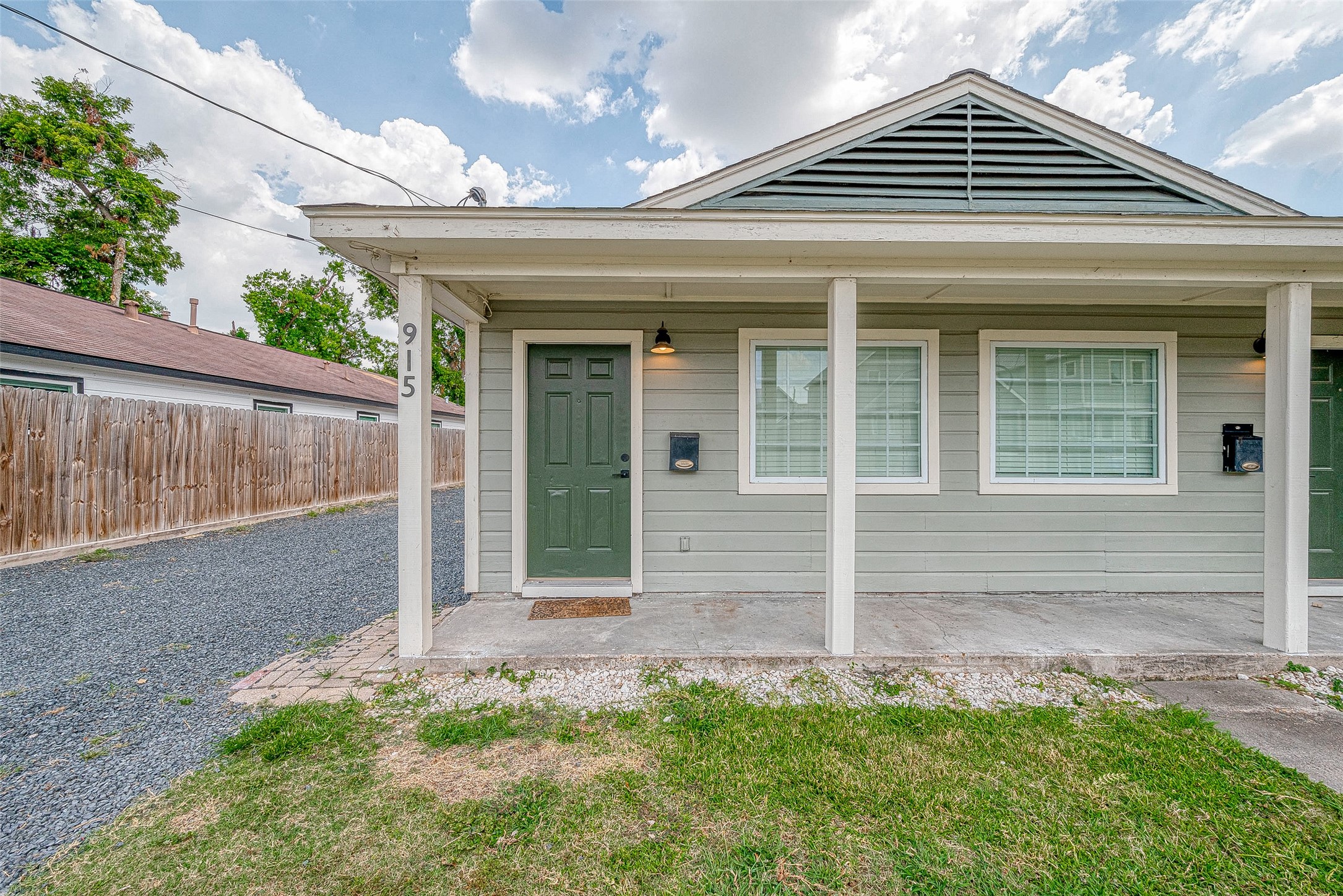 915 Adele Street Houston, TX 77009 - Photo 3 of 23 front view of a house with a yard