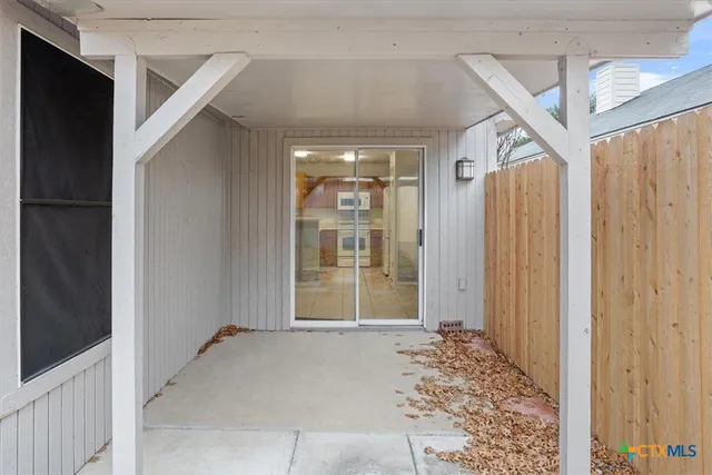 a view of a front door and porch