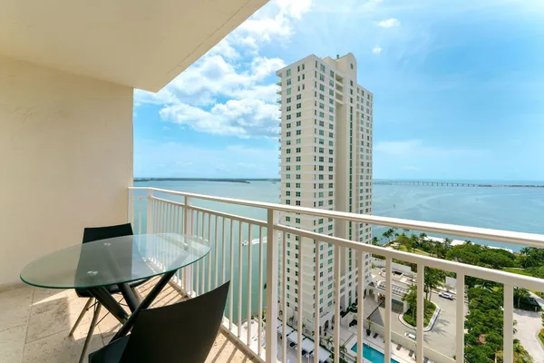 a view of balcony with wooden floor and outdoor space