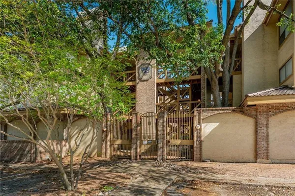 a house with trees in front of it