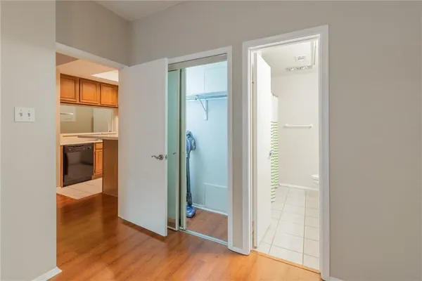 a view of a bathroom with a tub and shower