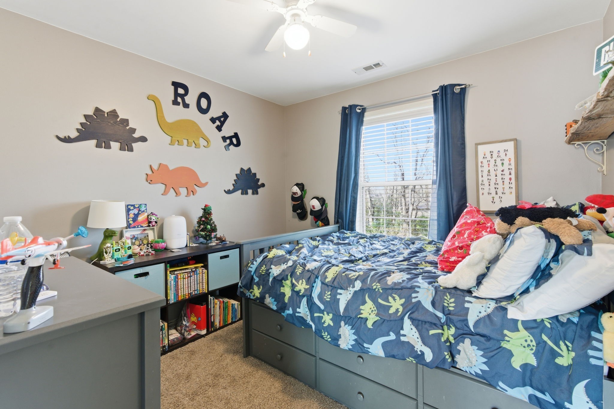 1766 Witt Way Drive Spring Hill, TN 37174 - Photo 20 of 36 a bedroom with bed and a window