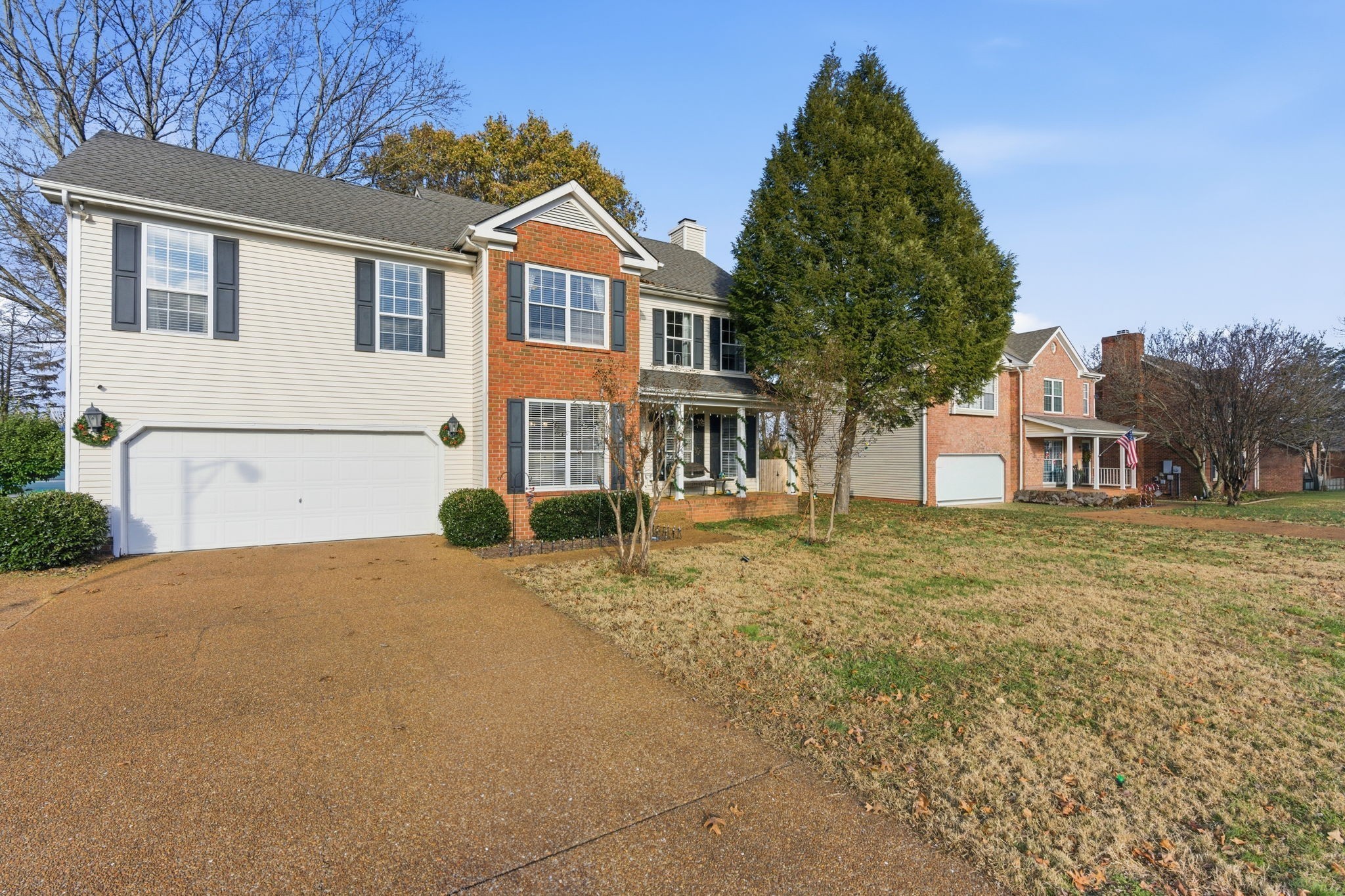 1766 Witt Way Drive Spring Hill, TN 37174 - Photo 2 of 36 a front view of a house with a yard
