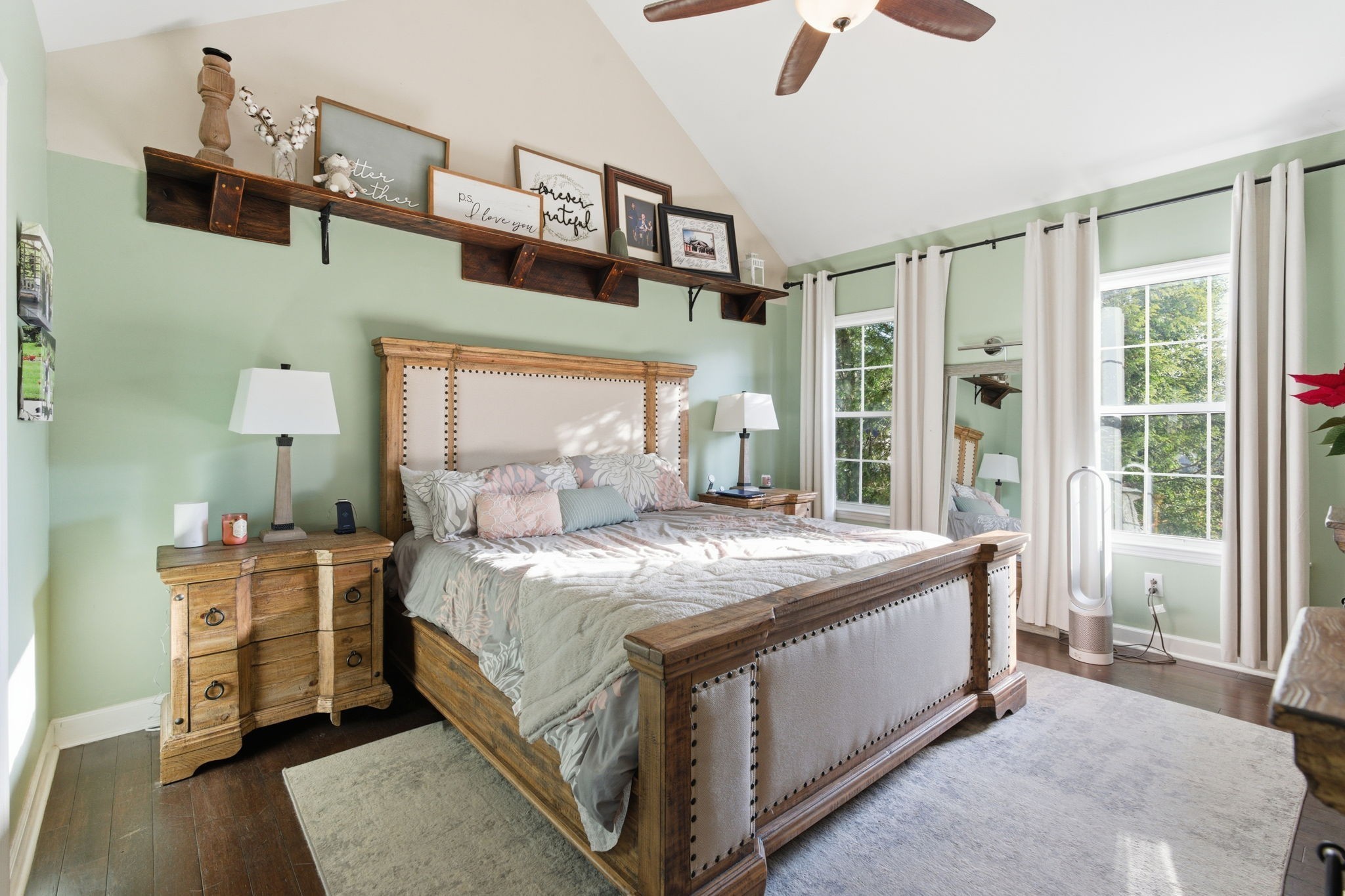 1766 Witt Way Drive Spring Hill, TN 37174 - Photo 23 of 36 a bed sitting in a bedroom next to a window