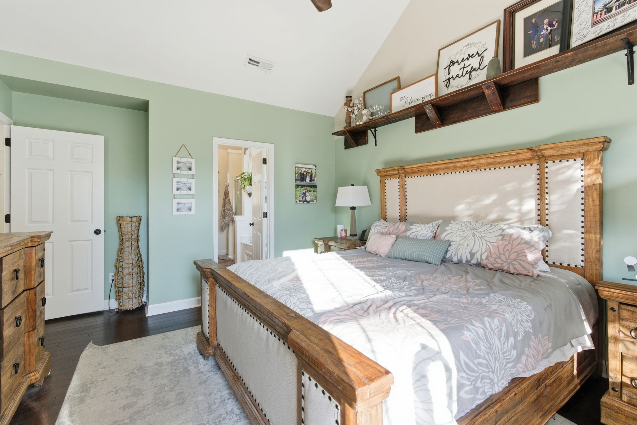 1766 Witt Way Drive Spring Hill, TN 37174 - Photo 24 of 36 a spacious bedroom with a large bed and a dresser