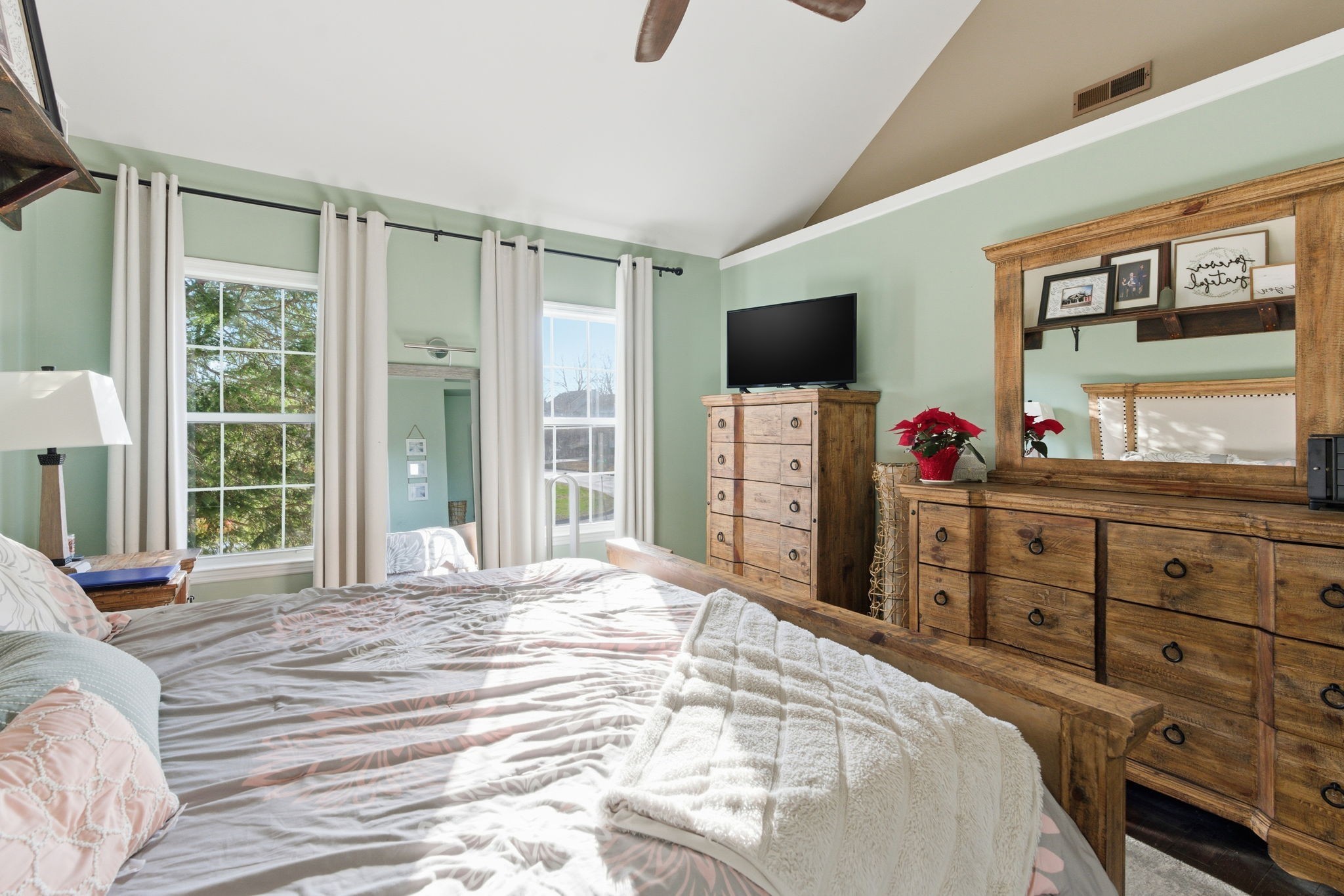 1766 Witt Way Drive Spring Hill, TN 37174 - Photo 26 of 36 a bedroom with a bed and flat screen tv
