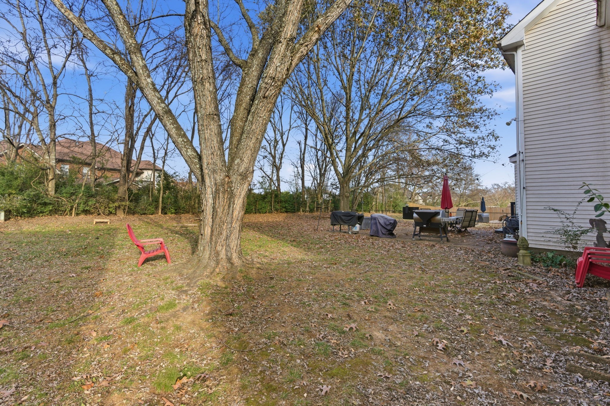 1766 Witt Way Drive Spring Hill, TN 37174 - Photo 31 of 36 a backyard of a house with table and chairs