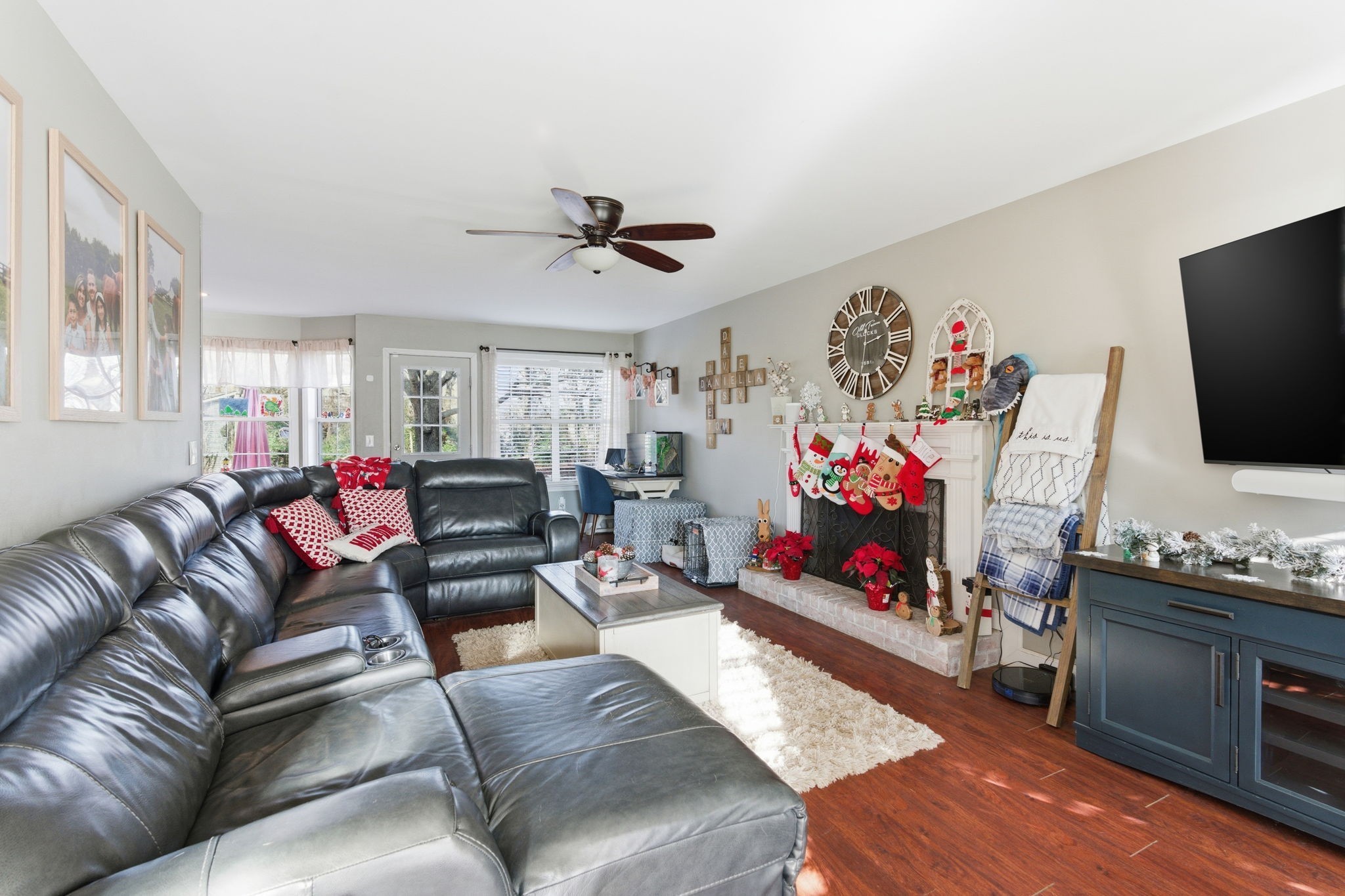 1766 Witt Way Drive Spring Hill, TN 37174 - Photo 4 of 36 a living room with furniture and a flat screen tv