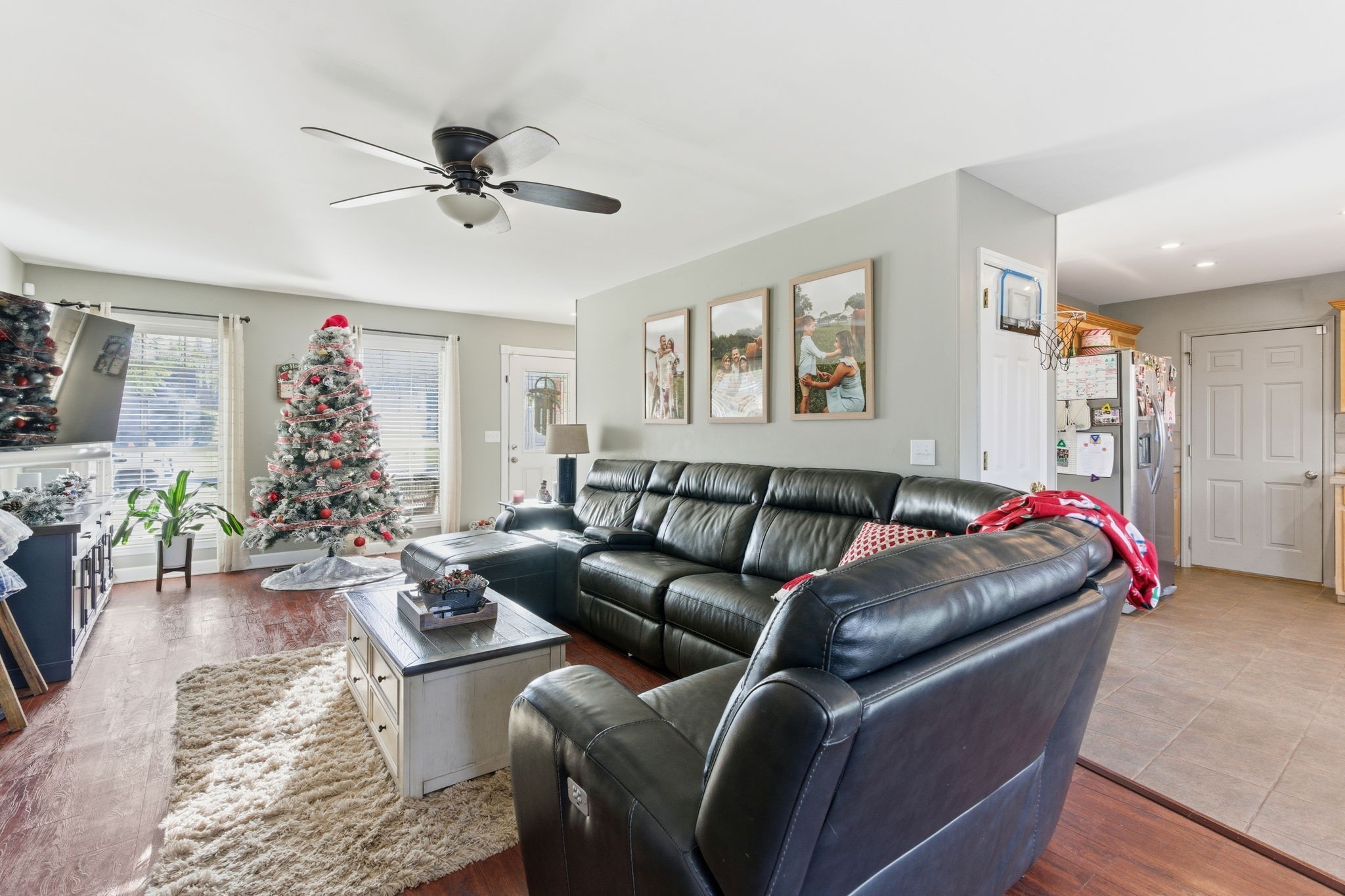 1766 Witt Way Drive Spring Hill, TN 37174 - Photo 6 of 36 a living room with furniture and a chandelier