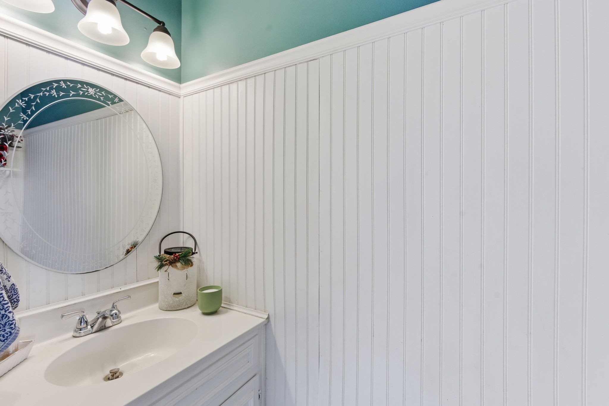 1766 Witt Way Drive Spring Hill, TN 37174 - Photo 8 of 36 a bathroom with a sink and a mirror