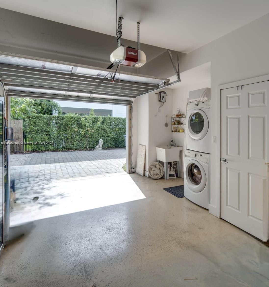 106 Florida Avenue Coral Gables, FL 33133 - Photo 13 of 34 a view of a storage & utility room with washer and dryer