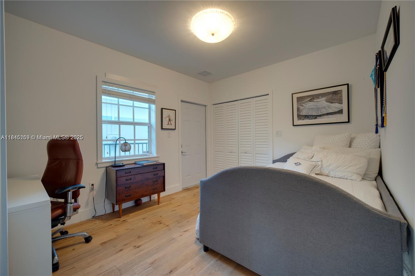 106 Florida Avenue Coral Gables, FL 33133 - Photo 16 of 34 a workspace with furniture and a window