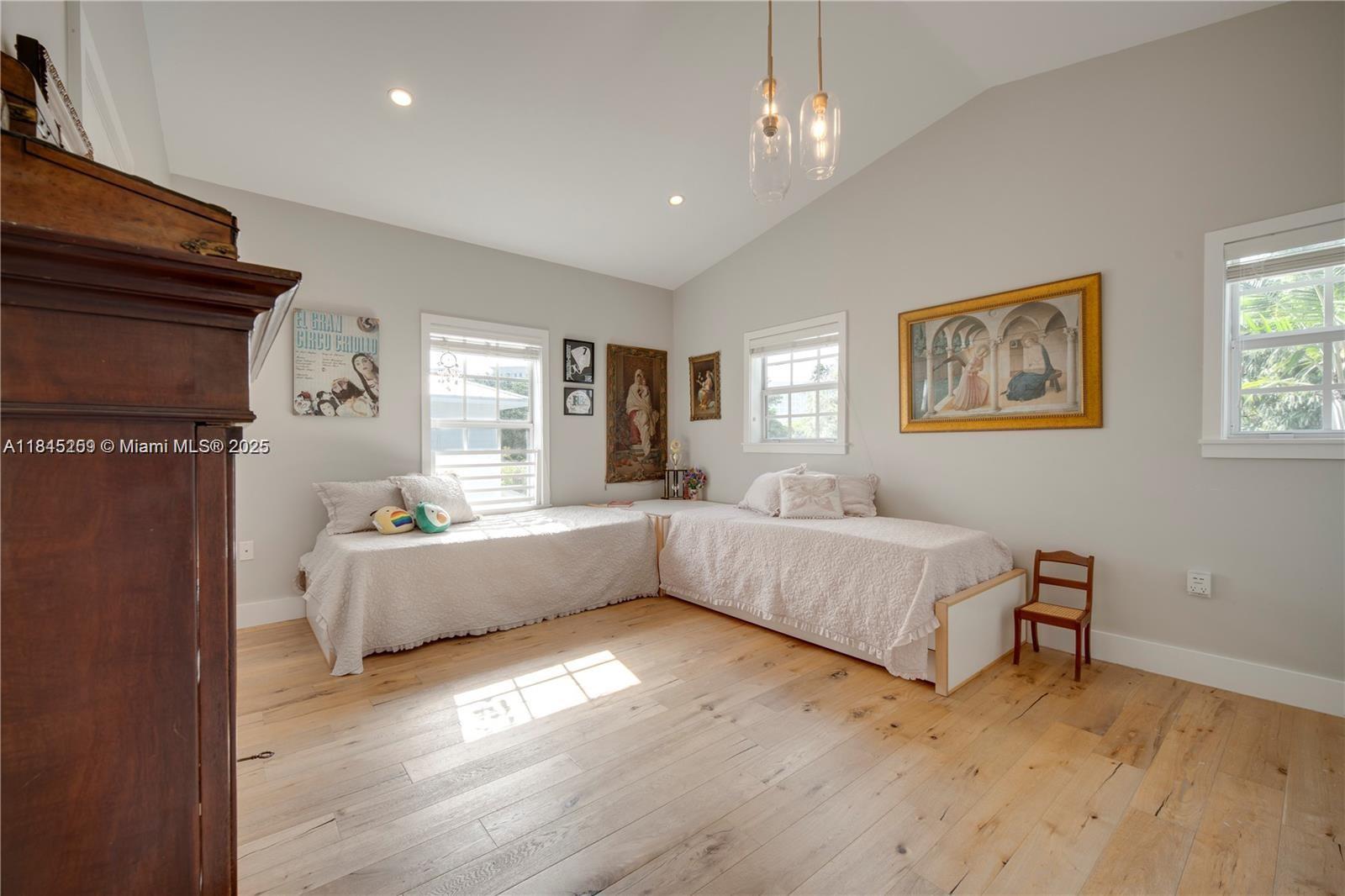 106 Florida Avenue Coral Gables, FL 33133 - Photo 19 of 34 a living room with furniture and a fireplace